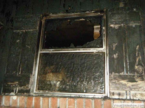 Before - Severely burned house